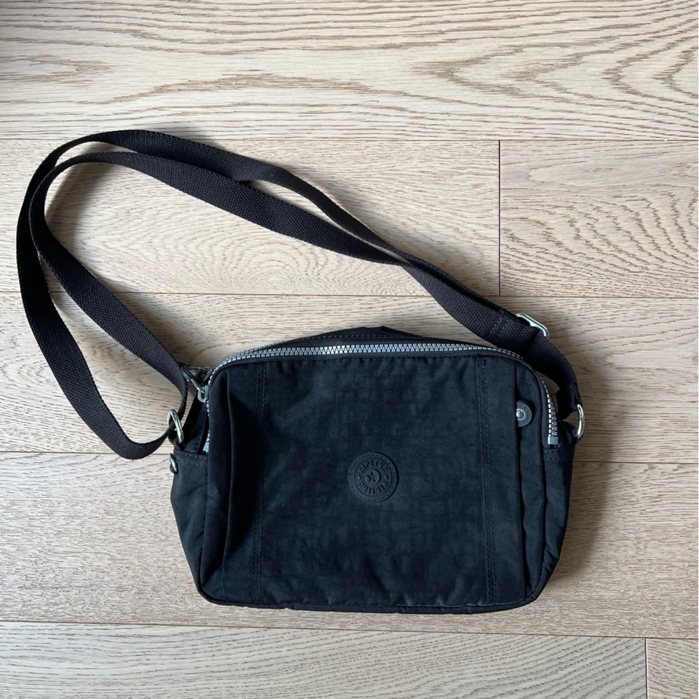Kipling cross body bag, like lightweight canvas.